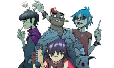 Ilustración de los personajes animados de la banda Gorillaz posando con sus instrumentos y atuendos característicos.