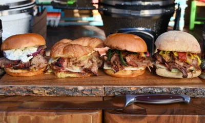 Variedad de sándwiches artesanales elaborados con ingredientes naturales, representando el valor y el esfuerzo detrás de la producción de alimentos sostenibles.