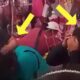 Comerciantes someten a dos mujeres acusadas de robo en un mercado, mientras varias personas observan y señalan la escena.