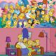 La familia Simpson sentada frente al televisor, símbolo de la crítica a la cultura mediática.