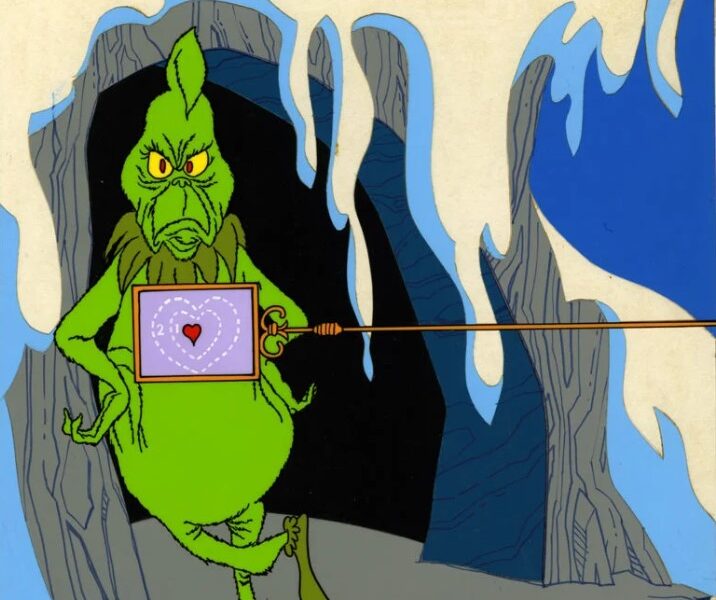 Ilustración del Grinch con expresión de disgusto frente a una cueva nevada.