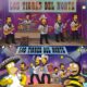 Fotografía de Los Tigres del Norte, cinco integrantes vestidos con trajes negros con aplicaciones de estampado tipo animal print, uno de ellos con sombrero.