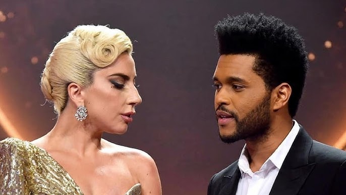 Lady Gaga y The Weeknd durante evento público, posible colaboración para el Mundial 2026.