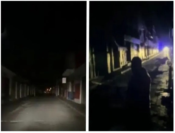 Calles de Atlixco sin alumbrado público tras la explosión de un transformador eléctrico durante la noche.