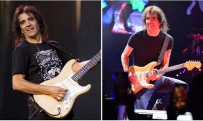 Músico tocando guitarra en escenario durante presentación en vivo