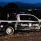 Patrulla de la Policía Estatal en operativo nocturno tras el hallazgo de dos comerciantes originarios de Atlixco asesinados en Izúcar de Matamoros.
