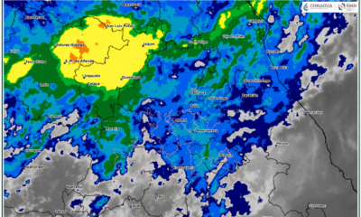 Imagen satelital GOES-19 que muestra nubosidad y áreas de lluvia sobre Puebla, destacando el Valle de Atlixco con pronóstico de precipitaciones moderadas a fuertes.