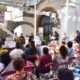 Presentación del libro Voces de Piedra en la Presidencia Municipal de Huaquechula con la participación de ciudadanos interesados en la historia y cultura local.