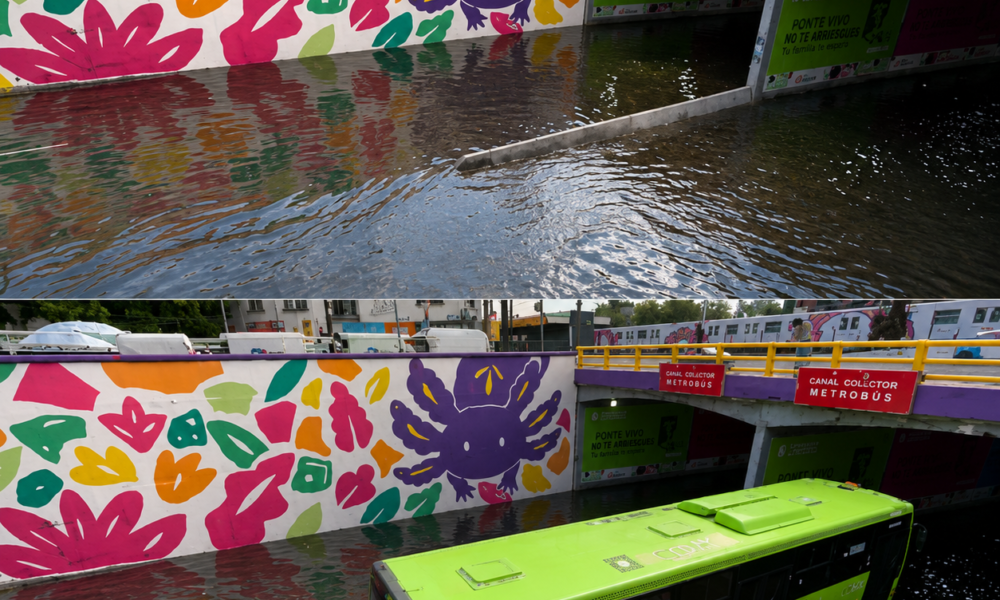 Paso a desnivel inundado en Ciudad de México con autobús circulando entre agua acumulada frente a mural urbano con ajolotes y colores vibrantes.