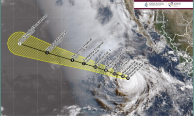 ALT: Trayectoria pronosticada del huracán Genevieve categoría 3 en el océano Pacífico.